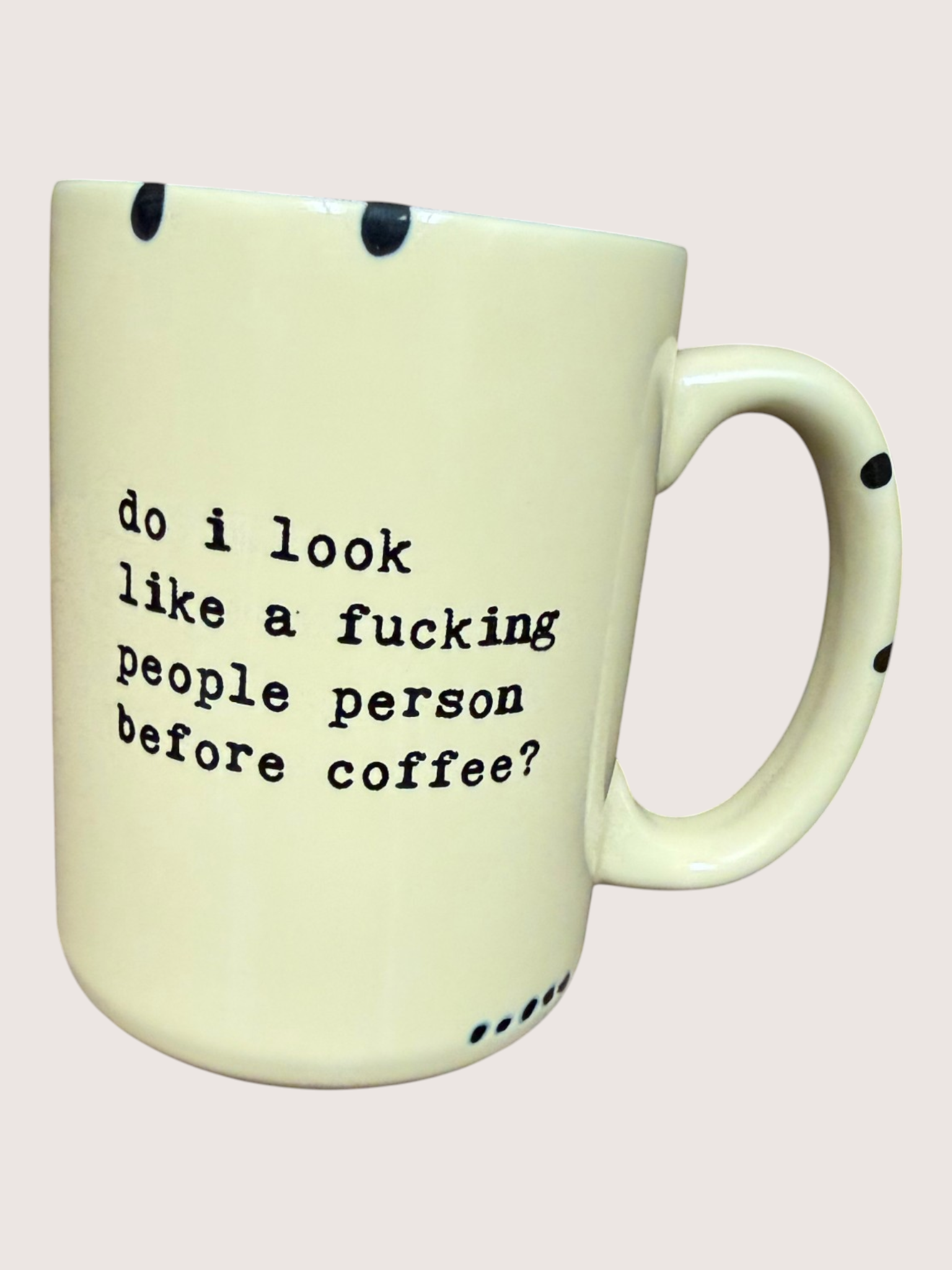 Mug with text 'do i look like a fucking people person before coffee?' on a light background