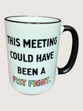 Mug with text 'This meeting could have been a fist fight' on a light background