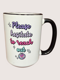 White mug with colorful text and graphics on a white background