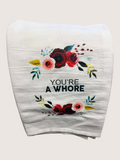Floral design tote bag with text on a white background