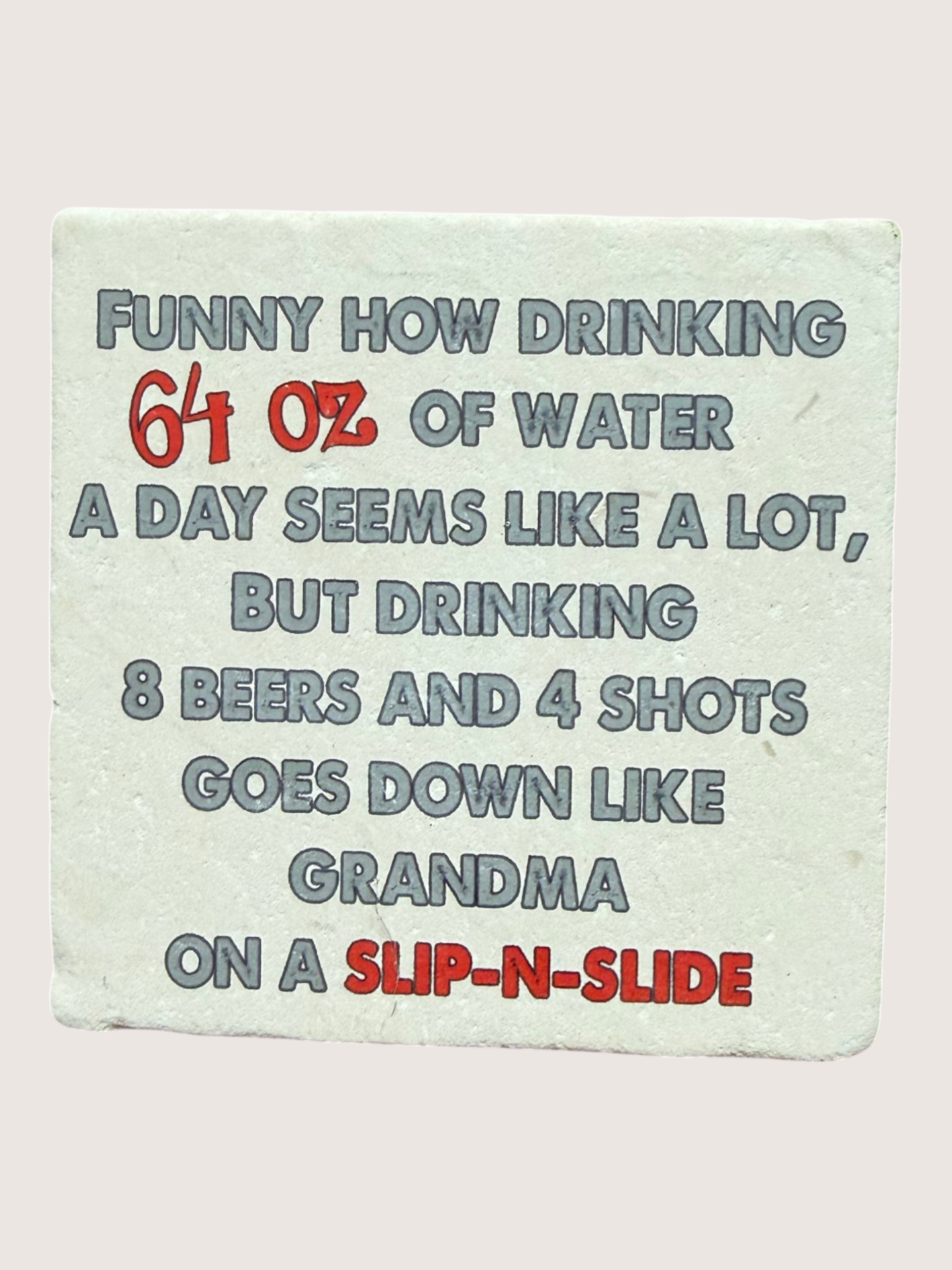 coaster with message on a light green background with humorous comparison between water consumption and alcohol intake.