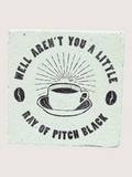 Coaster with coffee cup design and text on a light green background