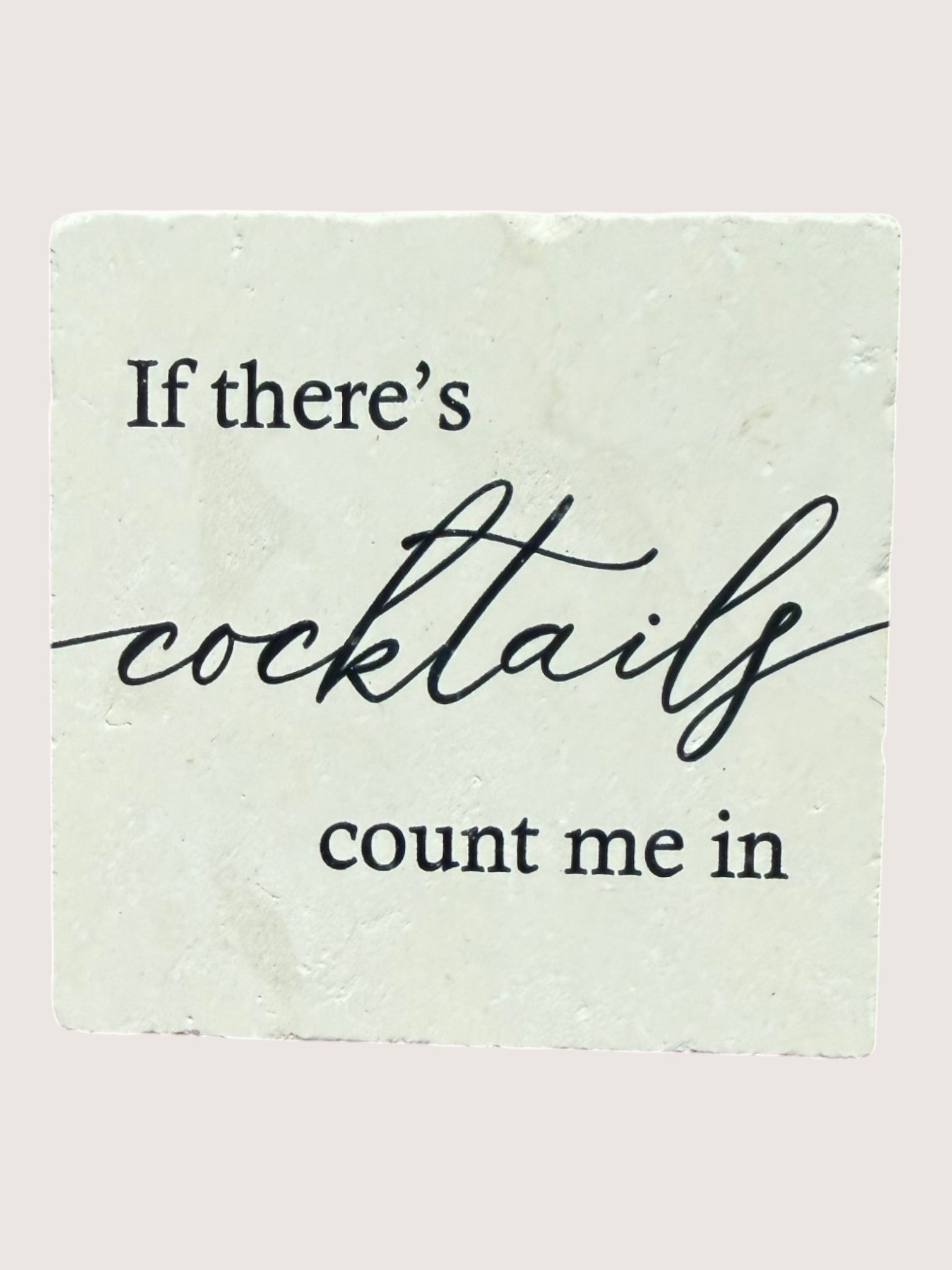 coaster 'If there's cocktails count me in' on a light green background