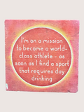 Pink coaster with humorous text on a white background