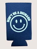Navy blue can cooler with smiley face and text 'Don't be a Richard' on a light gray background
