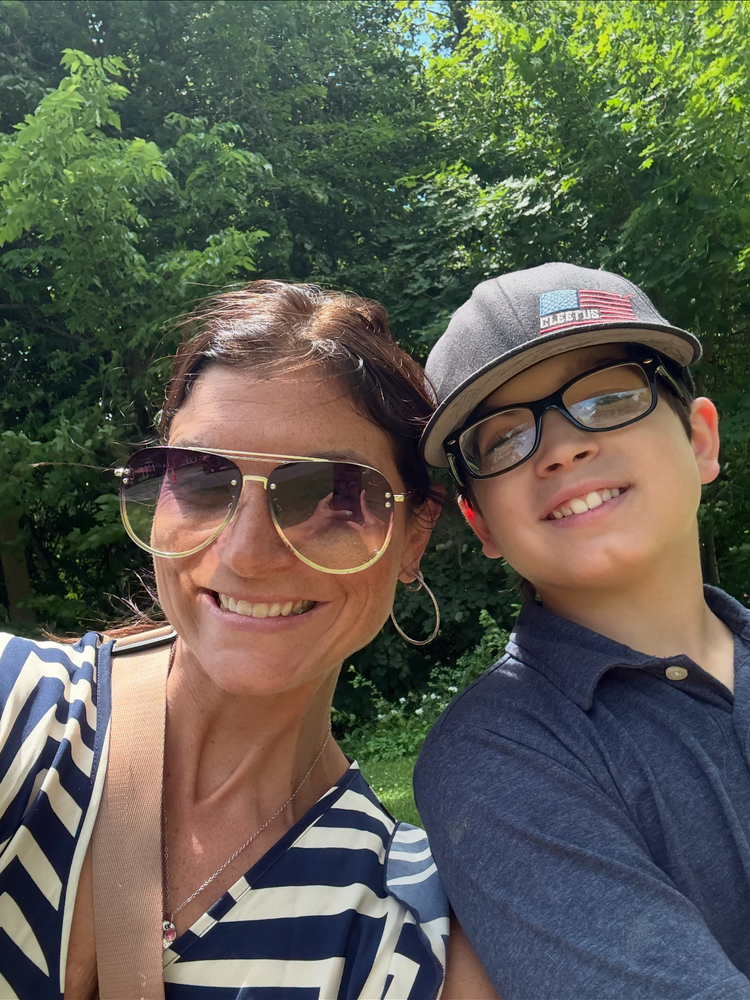 Jill and her son outdoors