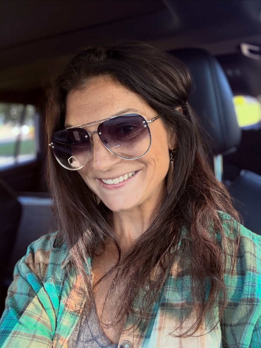 Jill smiling in sunglasses